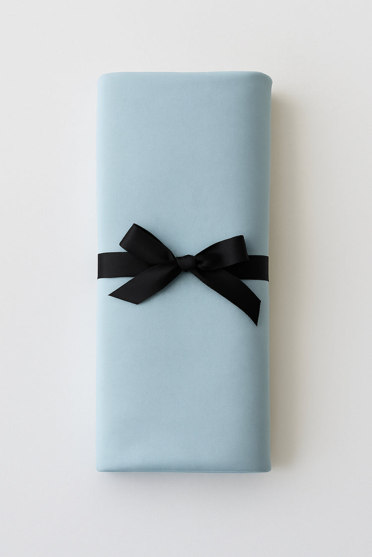 Folded light blue Aquamarine organic Cotton Venus Mat to protect mattress