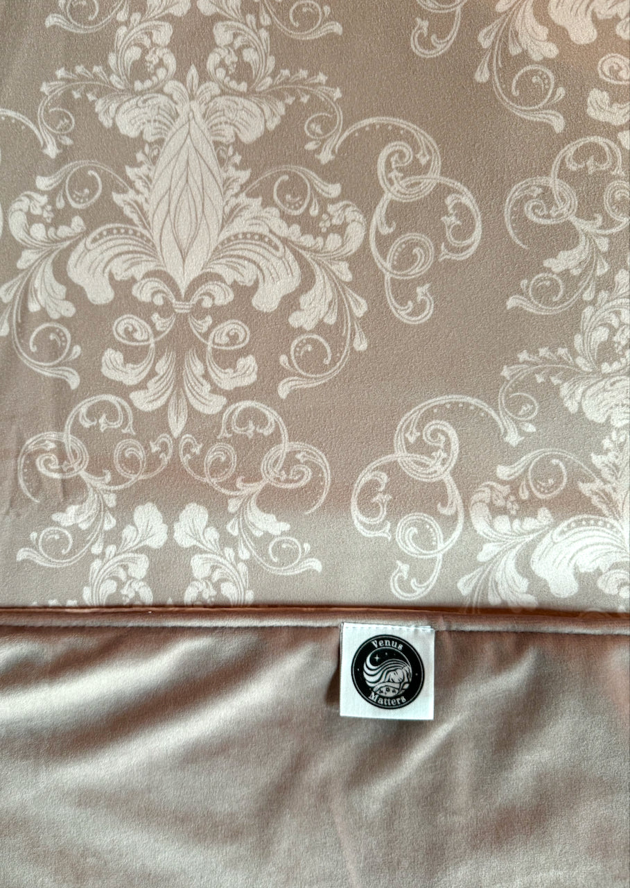 Detail of nude Her Majesty Venus Mat with tag bedding protection.