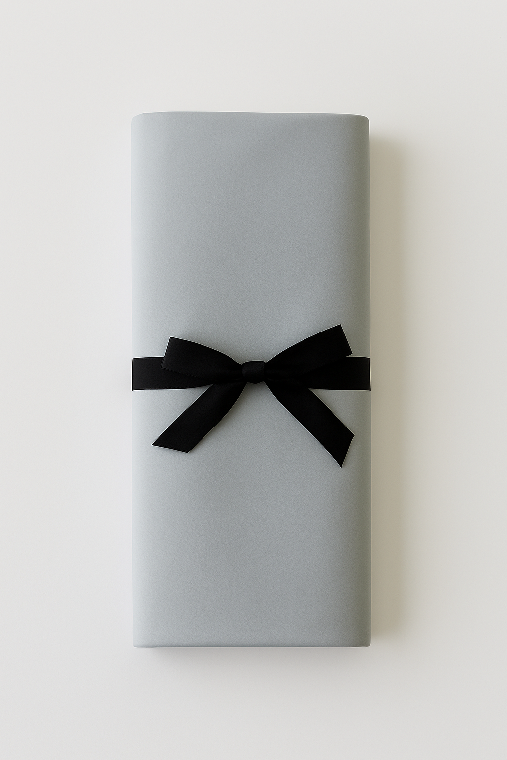 Folded gray Moonstone organic cotton venus mat low profile waterproof mattress protector