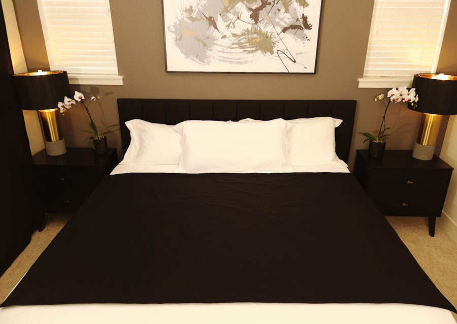 black venus mat sex mat on a bed